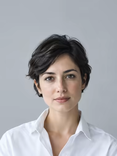 A candidate in a white shirt with a calm expression.